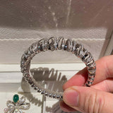 Eostre Bird Nest Diamond Bangle in 18k White Gold