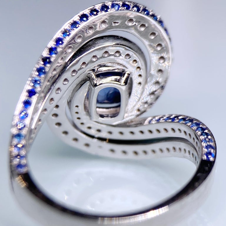 Eostre Vivid Blue Sapphire and Diamond White Gold Ring